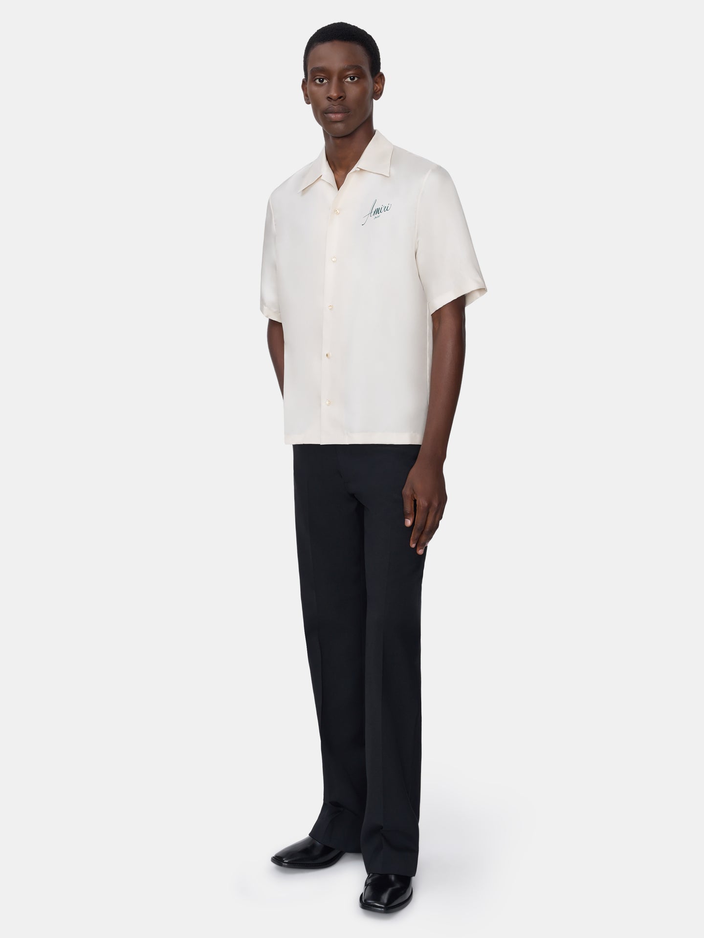 PANTALÓN BOOT CUT - NEGRO